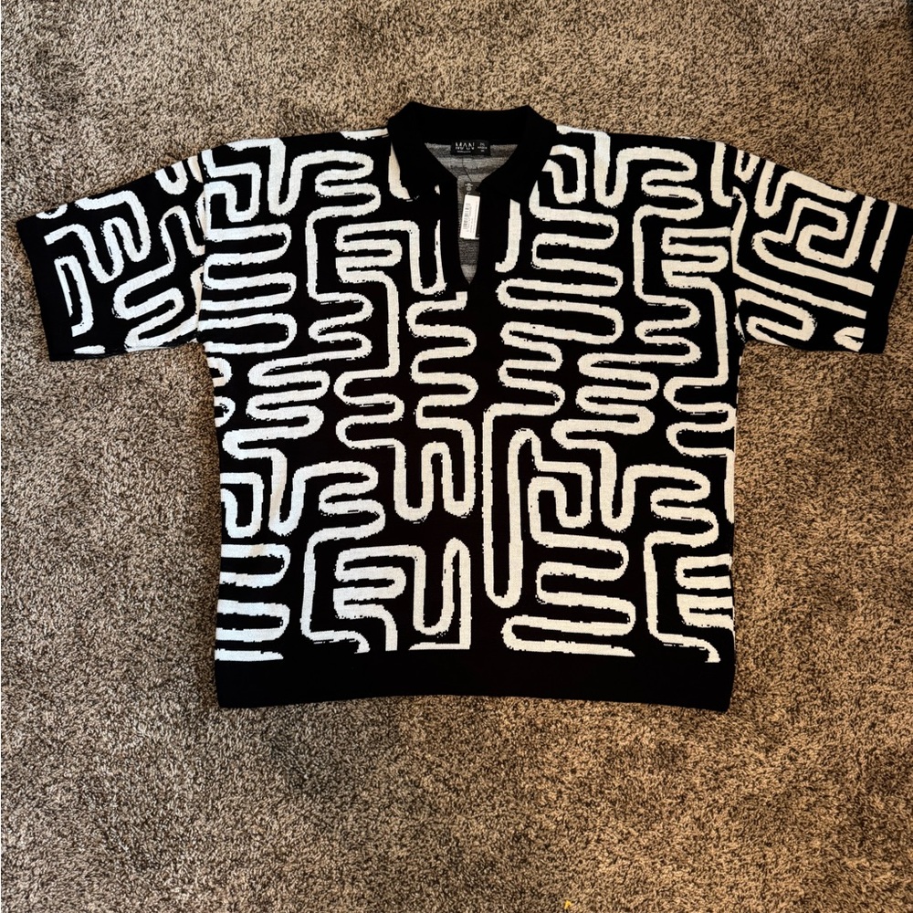 BoohooMAN’s Black and White Patterned Knit Polo Shirt
